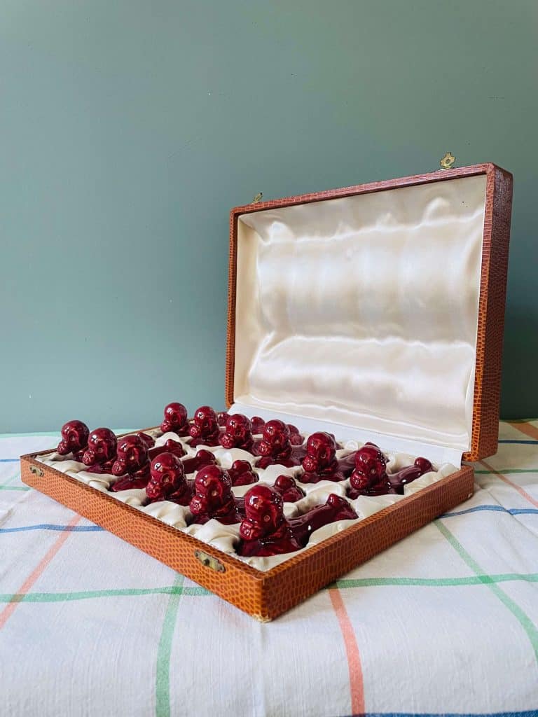 Boite de 12 anciens repose-couteaux vintage