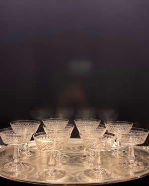 Suite de 10 coupes à champagne en cristal de Baccarat