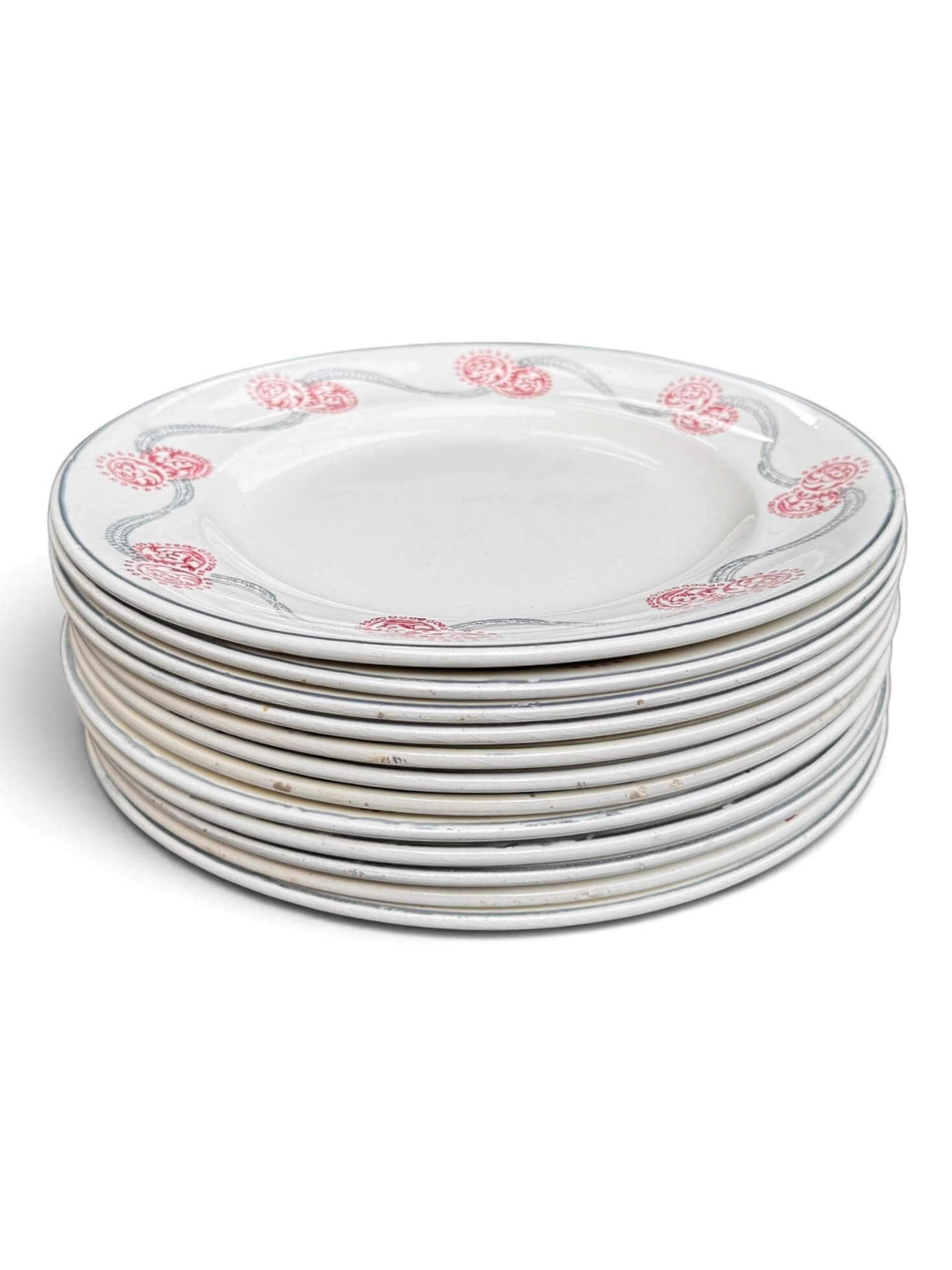 12 assiettes 1900 en faïence de Longwy